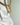 Gold chain with a tag on a white background